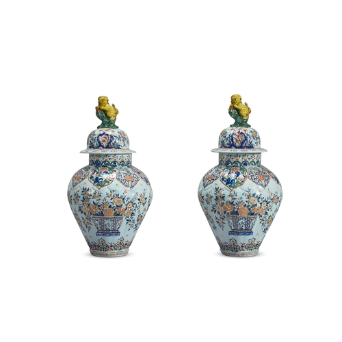 189 - A PAIR OF DELFT POLYCHROME VASES AND COVERS OF LARGE SIZEDUTCH, 19TH CENTURY, IN THE MANNER OF PIETE... 