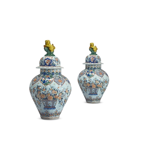 189 - A PAIR OF DELFT POLYCHROME VASES AND COVERS OF LARGE SIZEDUTCH, 19TH CENTURY, IN THE MANNER OF PIETE... 