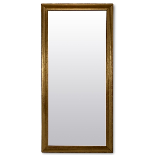 20 - A GILTWOOD MIRROR 20TH CENTURY With reeded frame173cm high, 83cm wide, 4cm deep