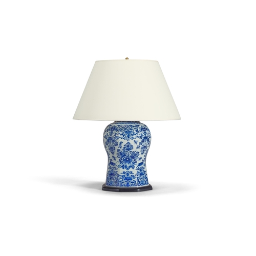 221 - A DELFT BLUE AND WHITE FACETTED VASEDUTCH, EARLY 19TH CENTURYMounted and wired as a lamp66cm high ov... 