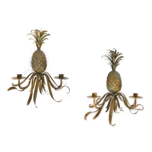 231 - A PAIR OF BRASS TWIN BRANCH WALL APPLIQUES STYLED AS PINEAPPLES FIRST HALF 20TH CENTURY 53cm high, 3... 