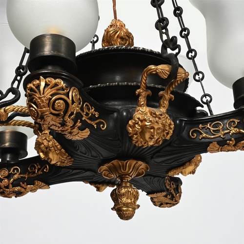 237 - A REGENCY ORMOLU AND BRONZE FOUR LIGHT COLZA CHANDELIER EARLY 19TH CENTURY Previously oil, now fitte... 