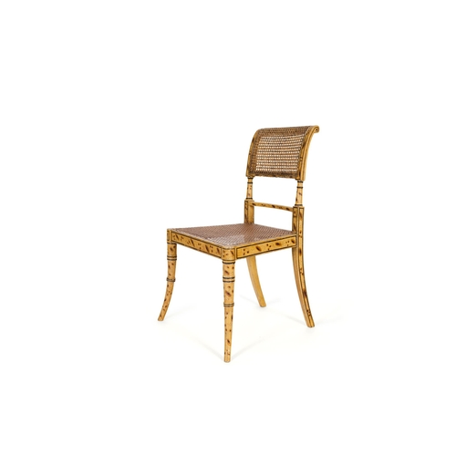 274 - A REGENCY PAINTED SIMULATED BAMBOO SIDE CHAIR EARLY 19TH CENTURY With a caned back and seat, stamped... 