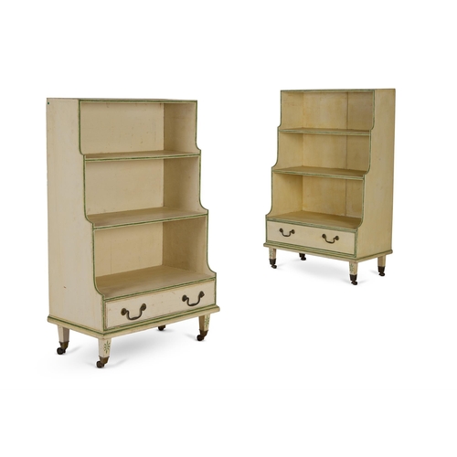 277 - A PAIR OF CREAM AND GREEN PAINTED WATERFALL BOOKCASES   ENGLISH, 19TH CENTURY Each with open shelves... 