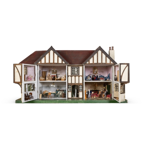 285 - A PAINTED DOLL'S HOUSE OF LARGE SIZEMID-20TH CENTURY Fitted with furniture and figures to the inside... 