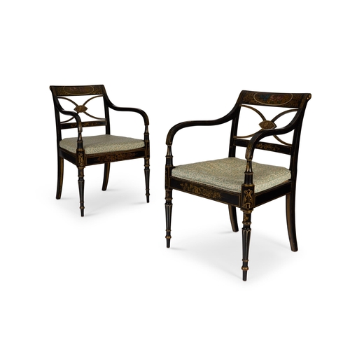 308 - A PAIR OF REGENCY AND LATER BLACK, GILT AND POLYCHROME-DECORATED OPEN ARMCHAIRSEARLY 19TH CENTURY Ea... 