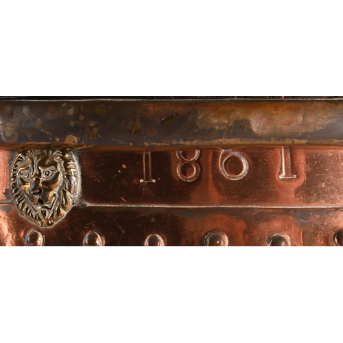 40 - A LARGE VICTORIAN COPPER AND BRASS COAL BUCKETSECOND HALF 19TH CENTURY On brass lion paw feet, with ... 