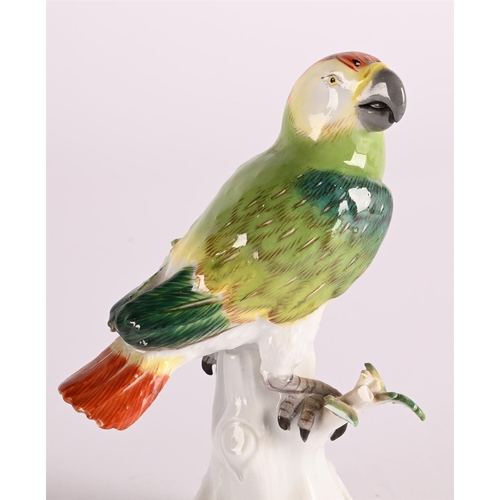 55 - A PAIR OF MEISSEN MODELS OF PARAKEETS20TH CENTURYEach perched on a tree stumpeach approximately 15.5... 