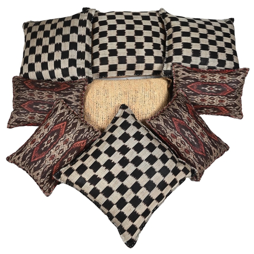 3 - TOMASZ STARZEWSKIEIGHT MONGOLIAN-STYLE PATTERNED THROW CUSHIONS, MODERNTogether with a natural weave... 