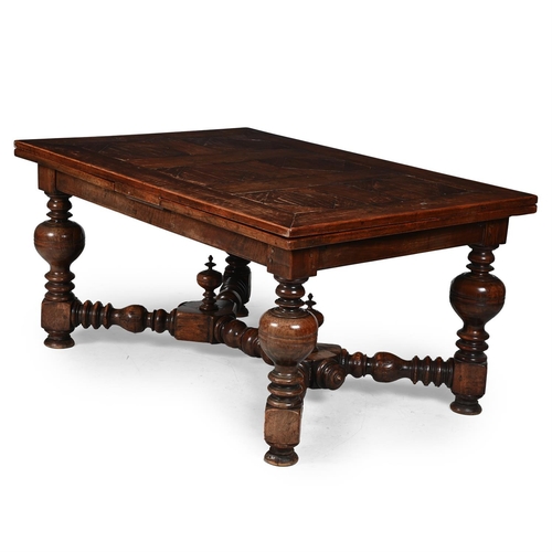 188 - A LARGE FRUITWOOD DRAWER-LEAF TABLE19TH CENTURY with substantial baluster turned legs and supports75... 