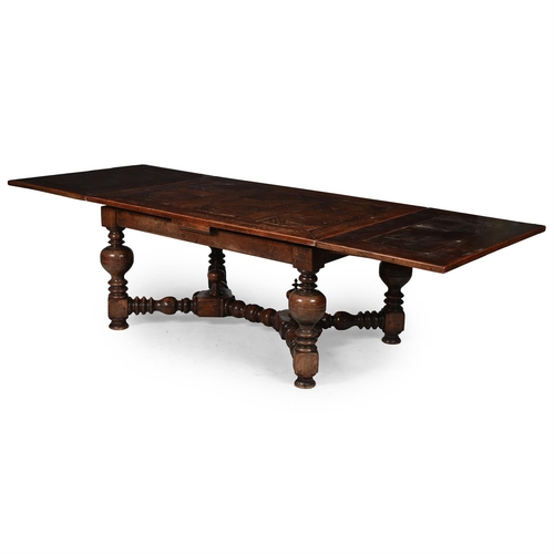 188 - A LARGE FRUITWOOD DRAWER-LEAF TABLE19TH CENTURY with substantial baluster turned legs and supports75... 