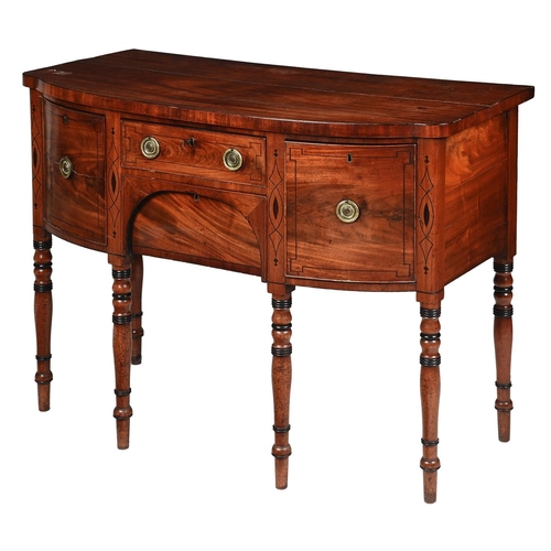 193 - A REGENCY MAHOGANY D-FRONTED SIDEBOARDCIRCA 1815The pearwood strung frieze drawer flanked by a cupbo... 