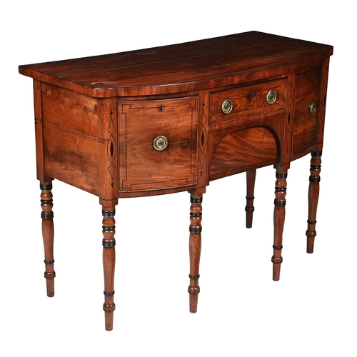 193 - A REGENCY MAHOGANY D-FRONTED SIDEBOARDCIRCA 1815The pearwood strung frieze drawer flanked by a cupbo... 