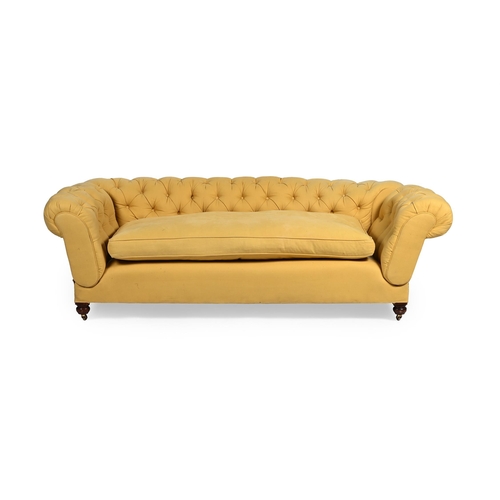 203 - A VICTORIAN MAHOGANY AND UPHOLSTERED SOFA LATE 19TH CENTURYOf Chesterfield type, with drop-arms71cm ... 