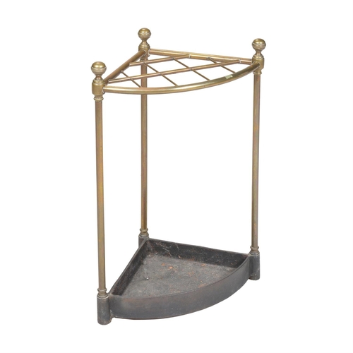 215 - A VICTORIAN BRASS AND CAST IRON STICK STANDSECOND HALF 19TH CENTURY62.5cm high, 43cm wide, 30cm deep