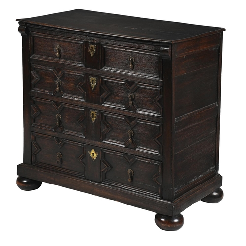 226 - A CHARLES II OAK MITRE MOULDED CHEST OF DRAWERSCIRCA 1690With arrangement of drawers, on bun feet93c... 