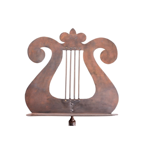 235 - A PAIR OF STEEL AND CAST IRON MUSIC STANDSSECOND HALF 19TH CENTURY AND LATER The triform bases secon... 