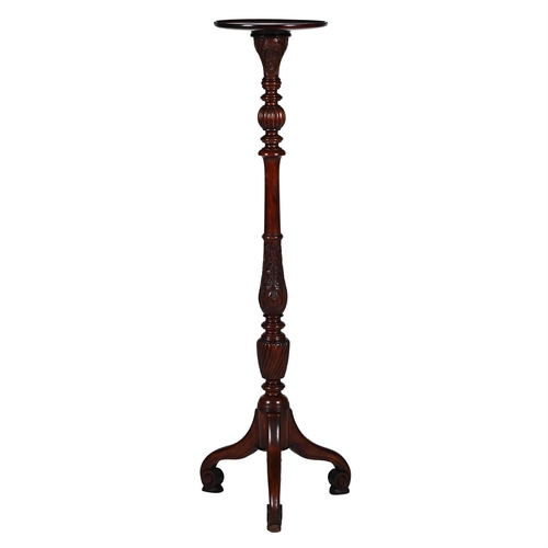 251 - A MAHOGANY TORCHERE STAND 19TH CENTURYWith carved, turned, and wrythen stem above tripod base137cm h... 