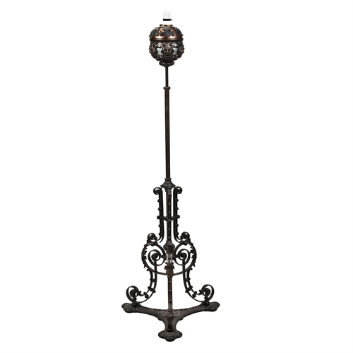 254 - A CAST, WROUGHT IRON AND COPPER MOUNTED STANDARD LAMP CIRCA 1900 AND LATER FITTED FOR ELECTRICITY138... 