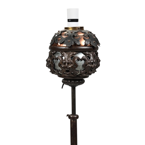 254 - A CAST, WROUGHT IRON AND COPPER MOUNTED STANDARD LAMP CIRCA 1900 AND LATER FITTED FOR ELECTRICITY138... 