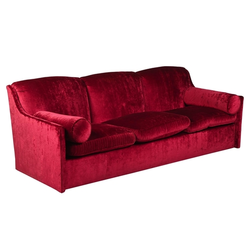 256 - A RED VELVET THREE SEAT SOFABY LUCY EADIE INTERIORS, OF RECENT MANUFACTURE88cm high, 244cm wide, 95c... 