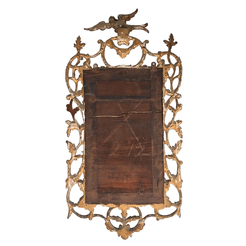 37 - A CARVED GILTWOOD WALL MIRROR MID 18TH CENTURY116cm high, 56cm wide Provenance:Purchased from Philli... 