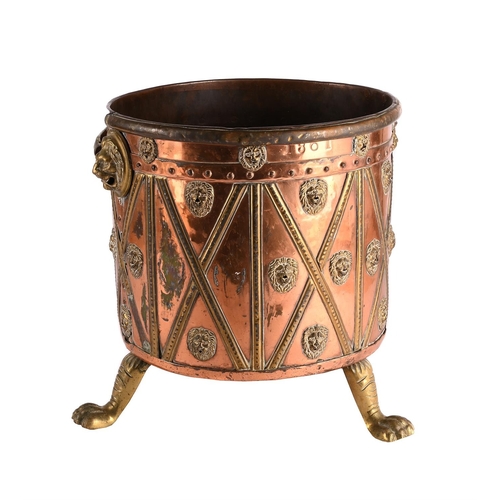 40 - A LARGE VICTORIAN COPPER AND BRASS COAL BUCKETSECOND HALF 19TH CENTURY On brass lion paw feet, with ... 