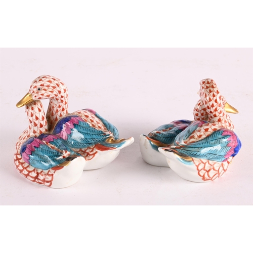 53 - TWO HEREND MODELS OF PAIRS OF DUCKS SECOND HALF 20TH CENTURY7cm high, 11cm long respectively