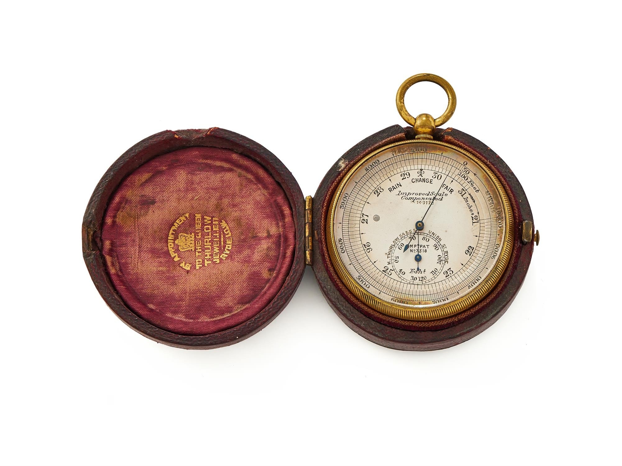 A LATE VICTORIAN GILT ANEROID POCKET BAROMETER WITH ALTIMETER SCALE AND ...