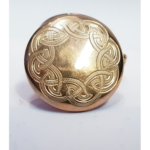 47 - A 9CT YELLOW GOLD LOCKET, with celtic design