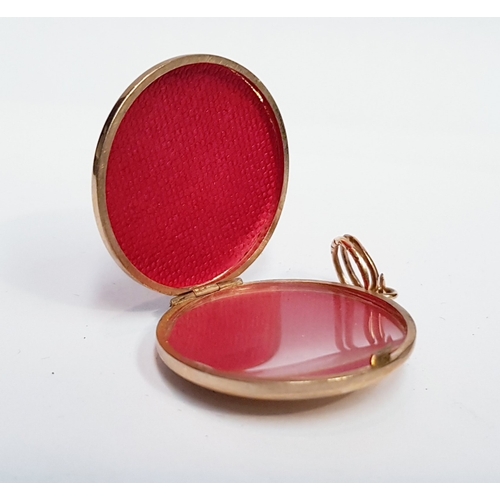 47 - A 9CT YELLOW GOLD LOCKET, with celtic design