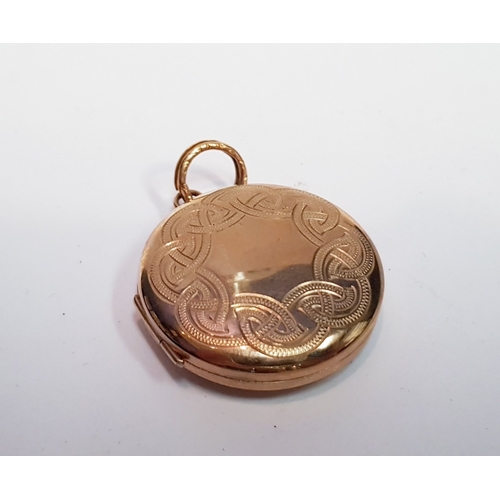 47 - A 9CT YELLOW GOLD LOCKET, with celtic design