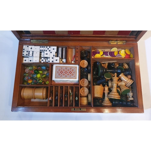 101 - A VERY GOOD 19TH CENTURY MAHOGANY GAMES BOX, which contains board games, chess and draughts pieces, ... 