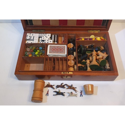 101 - A VERY GOOD 19TH CENTURY MAHOGANY GAMES BOX, which contains board games, chess and draughts pieces, ... 