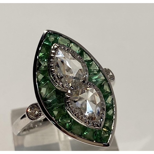 105 - A BEAUTIFUL 18CT WHITE GOLD ART DECO STYLE PERIDOT AND DIAMOND RING, with two central pear shaped di... 