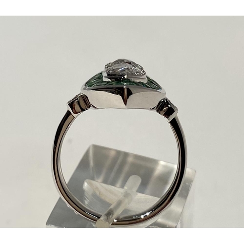 105 - A BEAUTIFUL 18CT WHITE GOLD ART DECO STYLE PERIDOT AND DIAMOND RING, with two central pear shaped di... 