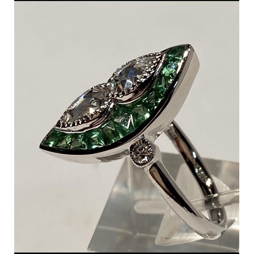 105 - A BEAUTIFUL 18CT WHITE GOLD ART DECO STYLE PERIDOT AND DIAMOND RING, with two central pear shaped di... 