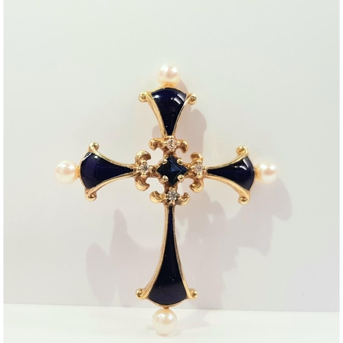 110 - A 14CT YELLOW GOLD FRANKLIN MINT MIDNIGHT SAPPHIRE CROSS PENDANT with central sapphire stone, a smal... 