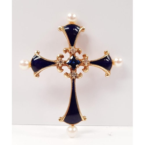 110 - A 14CT YELLOW GOLD FRANKLIN MINT MIDNIGHT SAPPHIRE CROSS PENDANT with central sapphire stone, a smal... 