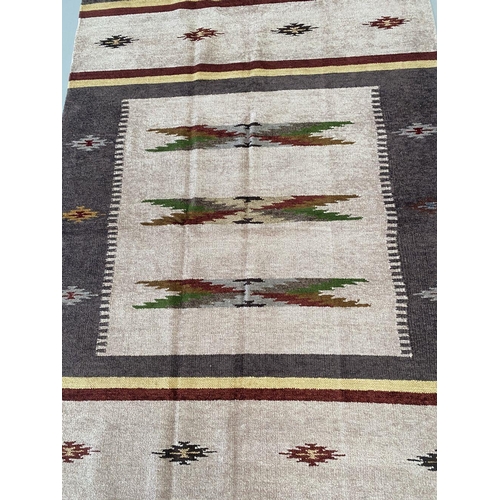 115 - A KELLIM RUG, hand woven over four months on an upright hand loom by two weavers in Benares (Varanas... 