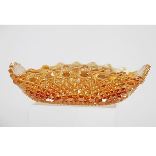 138 - AN EARLY 20TH CENTURY CARNIVAL GLASS BOWL, in orange/camber colour, square in shape, 23cm across app... 