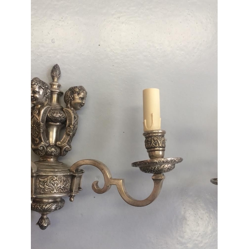 141 - A PAIR OF SILVER PLATED HEAVY CAST CANDELABRA SCONCE, decorated with floral and foliage motif and a ... 