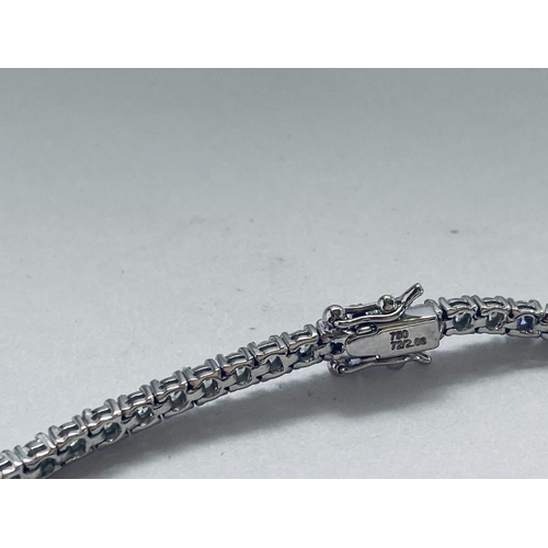 153 - AN 18CT WHITE GOLD DIAMOND TENNIS BRACELET, claw set diamonds, with double safety clasps, total diam... 