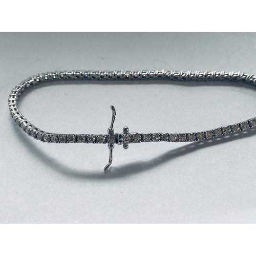 153 - AN 18CT WHITE GOLD DIAMOND TENNIS BRACELET, claw set diamonds, with double safety clasps, total diam... 