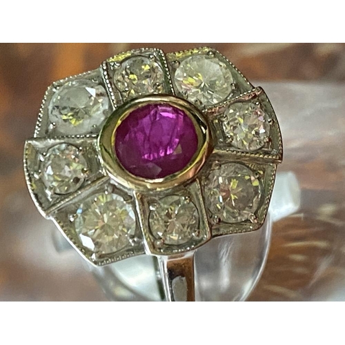 154 - AN 18CT WHITE GOLD VINTAGE BURMESE RUBY AND DIAMOND CLUSTER RING, .80ct ruby surrounded by 1.35cts o... 