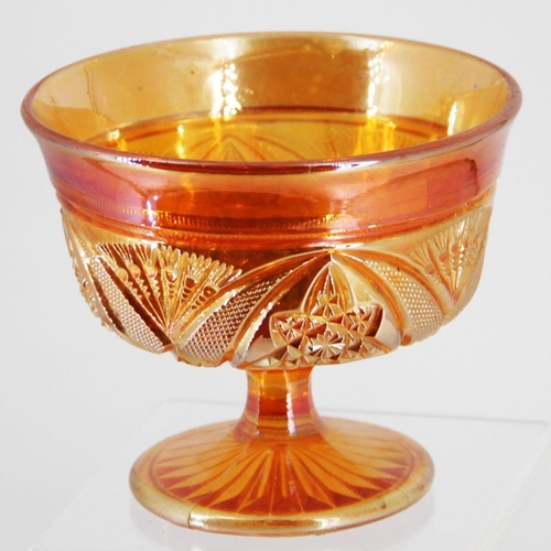 178 - AN EARLY 20TH CENTURY CARNIVAL GLASS BOWL, circa 1930s, in orange / amber colour, 12cm tall approx.