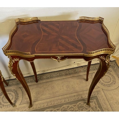 18 - A FINE PAIR OF FRENCH STYLE ROSEWOOD & MAHOGANY INLAID SIDE TABLES, each with raised pierced brass g... 