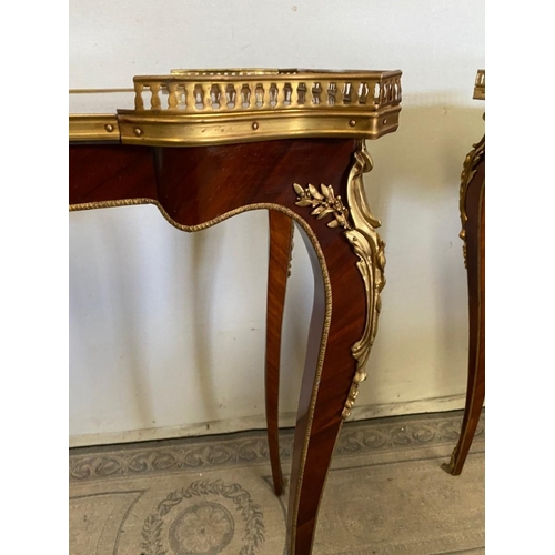 18 - A FINE PAIR OF FRENCH STYLE ROSEWOOD & MAHOGANY INLAID SIDE TABLES, each with raised pierced brass g... 