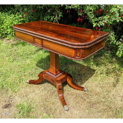 20 - A GOOD QUALITY REGENCY ROSEWOOD FOLD OVER CARD TABLE, with half circle edging detail and beaded deco... 