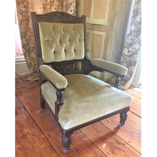 204 - A 19TH CENTURY MAHOGANY GENTLEMANS LIBRARY CHAIR, with carved crest rail over a buttoned back, padde... 